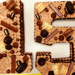 Custom-made theme and sculpted cakes by Blissful Bites.