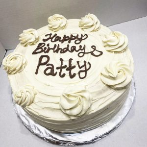 Signature four-layer celebration cake by Sweet Valley