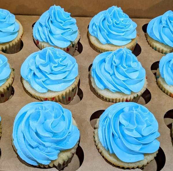 A set of 12 delicious cupcakes by Vennila Bites