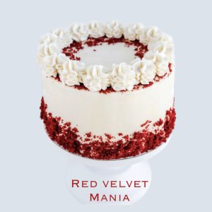 Red Velvet Cake with cream cheese icing and red velvet crumbs