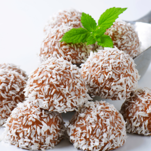 Handcrafted cocoa-coconut truffles in a pack of 6 by Blissful Bites.