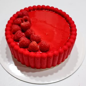 Handcrafted red mousse cake for festive celebrations