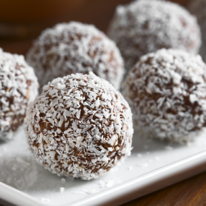 Handcrafted cocoa-coconut truffles in a pack of 6 by Blissful Bites.