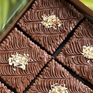 Handcrafted gourmet brownies in a box of six by Blissful Bites.