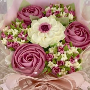 Edible floral cupcake bouquet with handcrafted buttercream flowers by Sweet Valley.