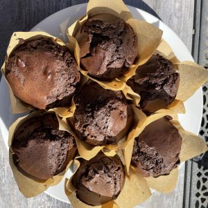 6 pack of double chocolate chip muffins, a treat for chocolate lovers.