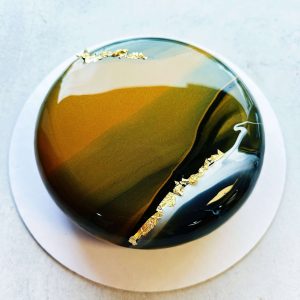 Glorious Golden Mousse Cake with golden marble glaze and gold leaf