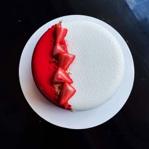 Fresh Summer Cake by V with strawberries and gold accents.