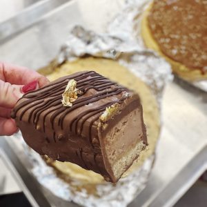 Chocolate-Dipped Cheesecake Slices on a Stick
